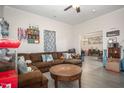 Spacious living room featuring a sectional sofa and a large coffee table at 607 Young St, Henderson, NC 27536