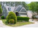 Gray house with green landscaping and mailbox at 105 Tracey Creek Ct Ct, Apex, NC 27502