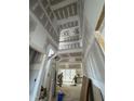 Under-construction home showcasing a two story foyer with open staircase at 1401 Cottondale Ln, Wake Forest, NC 27587