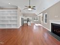 Open living room with hardwood floors and a view of the kitchen at 1813 Ferrell Meadows Dr, Zebulon, NC 27597