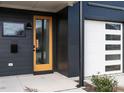 Stylish front door and entryway with modern fixtures at 705 Colleton Rd, Raleigh, NC 27610