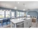 Modern kitchen with stainless steel appliances and an island at 287 Broomside Ave, Raleigh, NC 27603