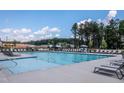Community pool with plenty of lounge chairs at 333 Broomside Ave, Raleigh, NC 27603