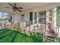 Relaxing front porch with rocking chairs, perfect for enjoying the outdoors at 505 Forrest St, Hillsborough, NC 27278