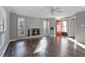 Bright living room with hardwood floors and fireplace at 514 New Kent Pl, Cary, NC 27511