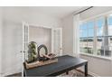 Bright office space with built-in shelving and large window at 64 Tributary Way, Fuquay Varina, NC 27526