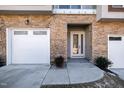 Townhome entrance with attached garage and modern design at 4015 Southpoint Lndg Way, Durham, NC 27707