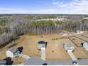Aerial view showing a house's location in a quiet residential neighborhood at 70 Kinsale Ct, Fuquay Varina, NC 27526