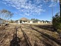 Spacious backyard with a view of neighboring houses at 78 Falls Of The Cape Dr, Lillington, NC 27546