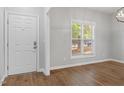 Bright entryway with hardwood floors and white door at 2635 Broad Oaks Pl, Raleigh, NC 27603