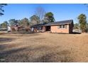 Brick Ranch home with a large front yard at 109 N Lakeside Dr, Smithfield, NC 27577