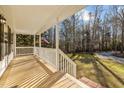 Spacious front porch overlooking wooded area at 341 Harts Creek Dr Dr, Pittsboro, NC 27312