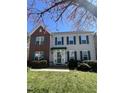 Inviting two-story home with green shutters and a well-kept lawn at 9201 Sayornis Ct, Raleigh, NC 27615