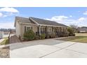 House with a large driveway and access ramp at 133 John Winstead Rd, Louisburg, NC 27549
