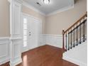 Bright entryway with hardwood floors and staircase at 1425 Stone Wealth Dr, Knightdale, NC 27545