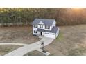 Two-story house with driveway and basketball hoop in the backyard at 263 Langdon Chase Way, Selma, NC 27576