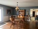 Charming dining room with wood table and built-in hutch at 8110 Nc 210 N, Angier, NC 27501