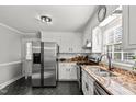 Modern kitchen with stainless steel appliances and granite countertops at 1117 Beechwood Dr, Rocky Mount, NC 27803