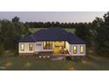 New construction home featuring a large deck and private backyard at 139 Quail Pt, Pittsboro, NC 27312