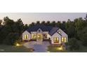 Luxury home with a spacious backyard and beautifully landscaped surroundings at 139 Quail Pt, Pittsboro, NC 27312