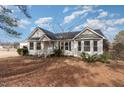 Front view of a single-story house with a yard at 210 Alfalfa Ct, Smithfield, NC 27577