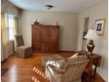 Living room with hardwood floors and comfy seating at 404 W Ninth St, Siler City, NC 27344