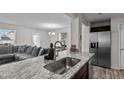 Modern kitchen with stainless steel appliances and granite countertops at 810 Brake St, Nashville, NC 27856
