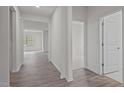 Bright and spacious hallway with wood-look floors at 1141 Middlecrest Dr, Rocky Mount, NC 27804