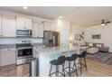 Modern kitchen with granite countertops and stainless steel appliances at 1609 Mallard Trace Dr, Wendell, NC 27591