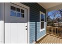 White front door with a window and black door handles at 343 Foster St, Burlington, NC 27217