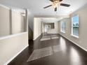 Spacious living room with dark hardwood floors and lots of natural light at 5023 Lalex Ln, Cary, NC 27519