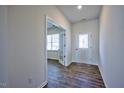 Bright foyer with wood-look floors and french doors leading to an office at 1108 Middlecrest Dr, Rocky Mount, NC 27804