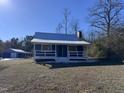 Newly renovated blue home with detached garage and large yard at 3612 Mt Zion Church Rd, Mebane, NC 27302