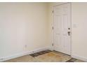 Simple entryway with a carpeted floor and a door at 3050 Bennett Siler City Rd, Bennett, NC 27208