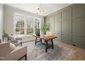 Stylish office with wainscoting, large windows, and ample natural light at 4005 Brevard Pl, Raleigh, NC 27609