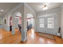 Bright entryway with hardwood floors and arched openings at 255 Dupree Rd, Willow Springs, NC 27592