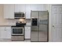 Kitchen features stainless steel appliances and granite countertops at 3124 Gross Ave, Wake Forest, NC 27587