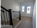 Inviting entryway showcases light hardwood floors and a brightly lit white door and window at 3275 Roundly Rd # 10, New Hill, NC 27562