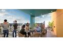 Relaxing community patio with city views and seating at 507 Yancey St # 508, Durham, NC 27701