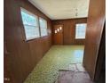 Features wood paneling and tiled floors at 530 W King St, Hillsborough, NC 27278
