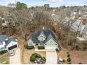 Aerial view of a house showcasing its size and backyard at 102 Kensbury Cir, Cary, NC 27513