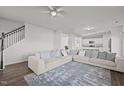 Spacious living room with L-shaped sectional sofa and fireplace at 105 Kcf Dr, Elon, NC 27244