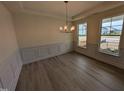 Dining room features stylish floors, recessed lighting, and large windows at 19 Grassland Dr, Garner, NC 27529