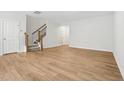 Spacious living room featuring wood-look floors and neutral paint at 2006 Regal Dr # 85, Durham, NC 27703