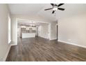 Spacious living room with hardwood floors, high ceilings, and open concept at 303 E Pope Ave, Kenly, NC 27542