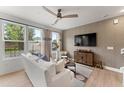 Spacious living room with large windows and stylish decor at 412 Gaston Park Ln # 100, Wake Forest, NC 27587