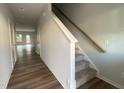 Bright entryway with hardwood floors and staircase at 5002 Cambrey Dr # 2, Durham, NC 27703
