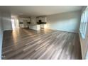 Spacious living room with hardwood floors and lots of natural light at 5002 Cambrey Dr # 2, Durham, NC 27703