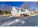 Two new homes with front porches and landscaping at 1039 W Murray Ave, Durham, NC 27704