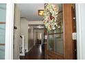 Bright and spacious entryway with hardwood floors and staircase at 128 Bruce Dr, Cary, NC 27511